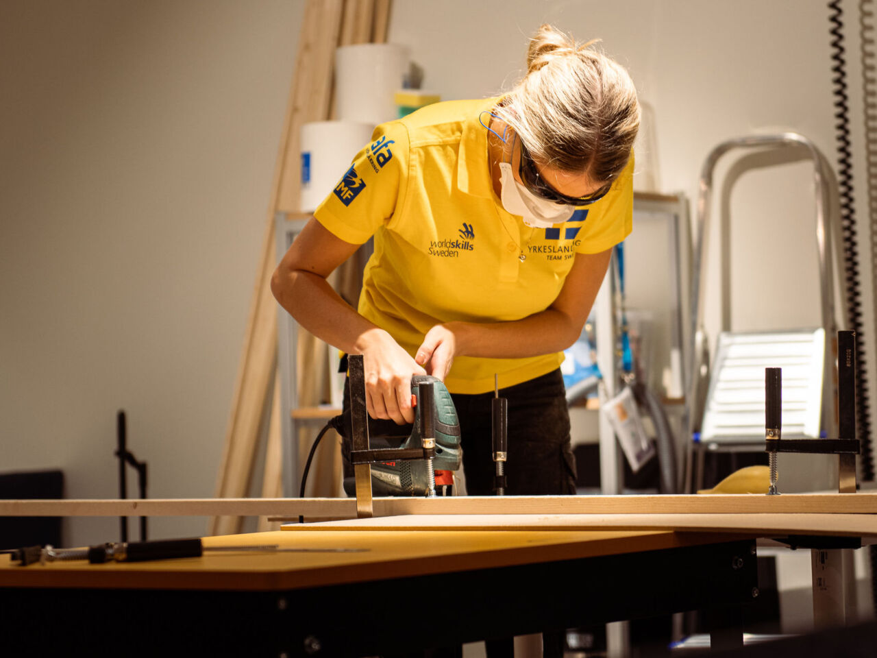 A competitor from Sweden cuts a board with a jigsaw as part of the Visual Merchandising competition which took place from 14 to 17 October 2022 in Stockholm, Sweden.
