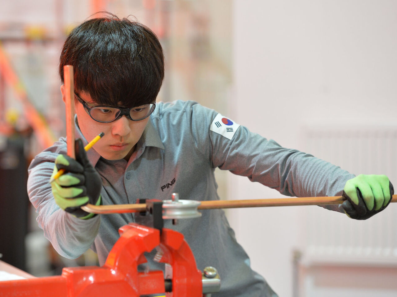 A plumbing and heating competitor from Korea at WorldSkills Kazan 2019.