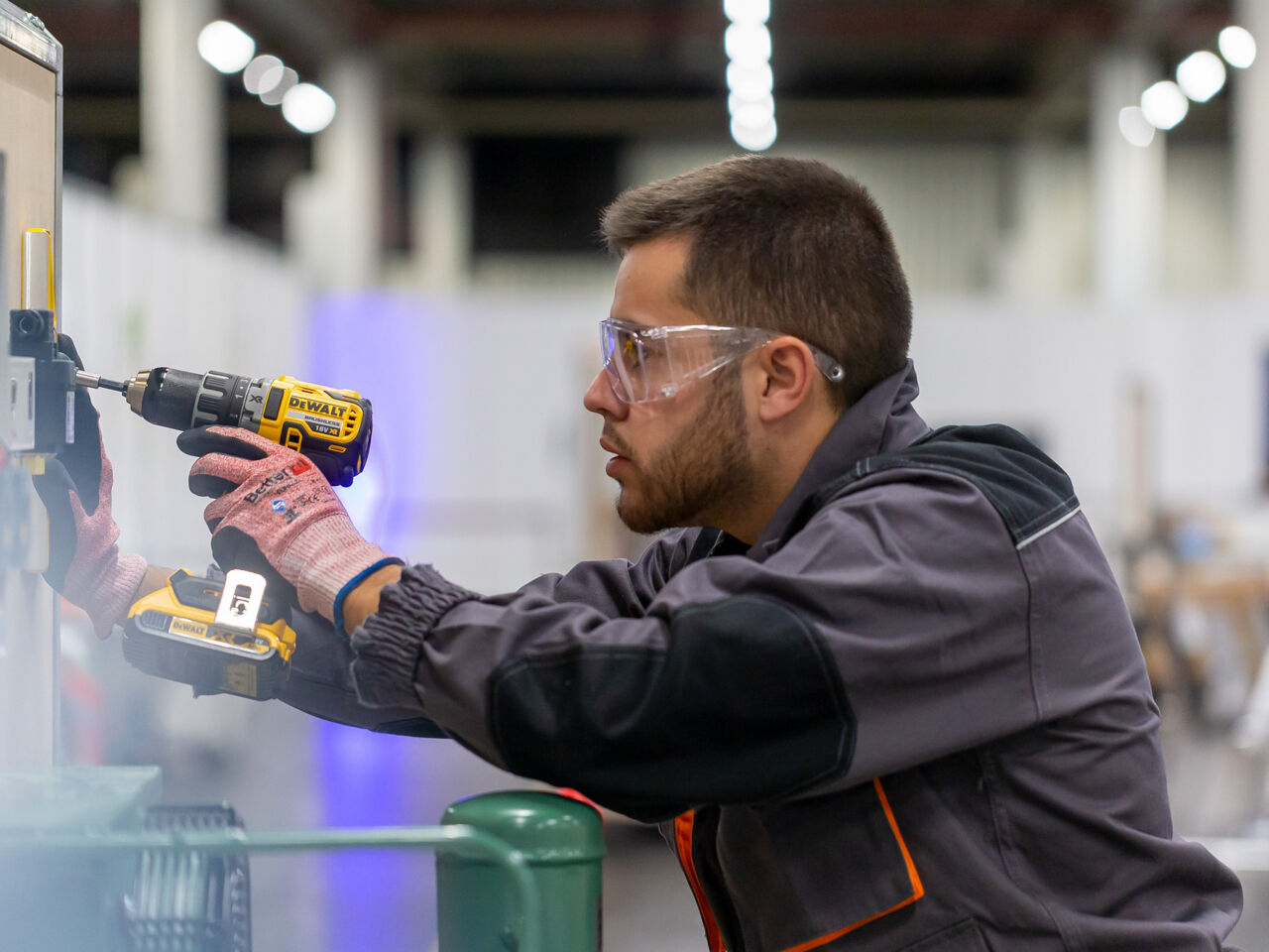 A competitor fixing equipment to a wall during Refrigeration and Air Conditioning in Nuremberg, Germany from 10–13 October 2022.